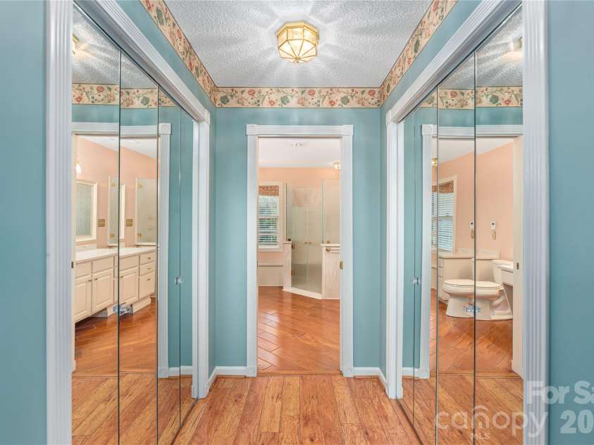 11 Heather Way, Candler, NC 28715.  MLS# CAR4381807, YatesRealty ID 30816. Large closets walking into primary bathroom