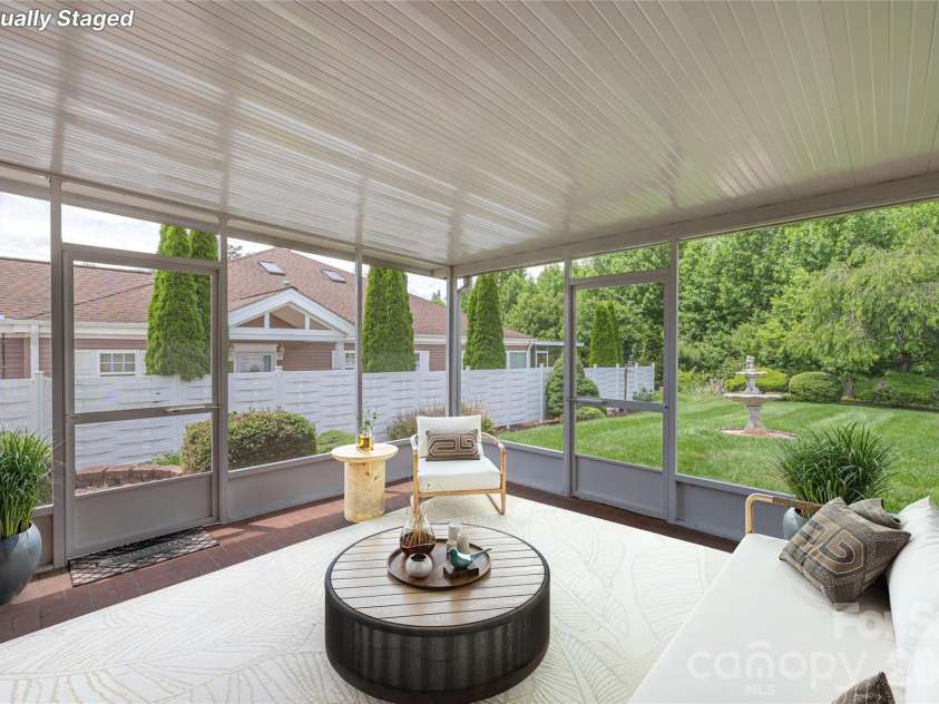 11 Heather Way, Candler, NC 28715.  MLS# CAR4381807, YatesRealty ID 30816. Virtually staged screened patio
