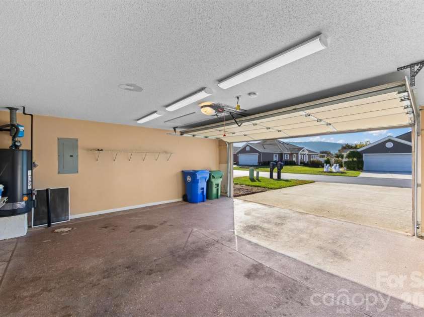 11 Heather Way, Candler, NC 28715.  MLS# CAR4435502, YatesRealty ID 30816. Garage
