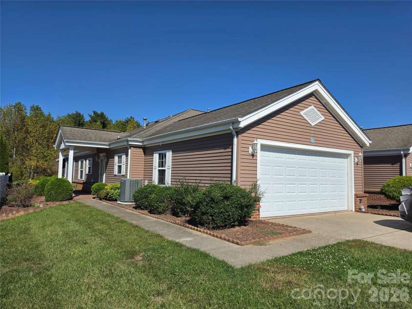 11 Heather Way, Candler, NC 28715.  MLS# CAR4435502, YatesRealty ID 30816. Walk way to the front door