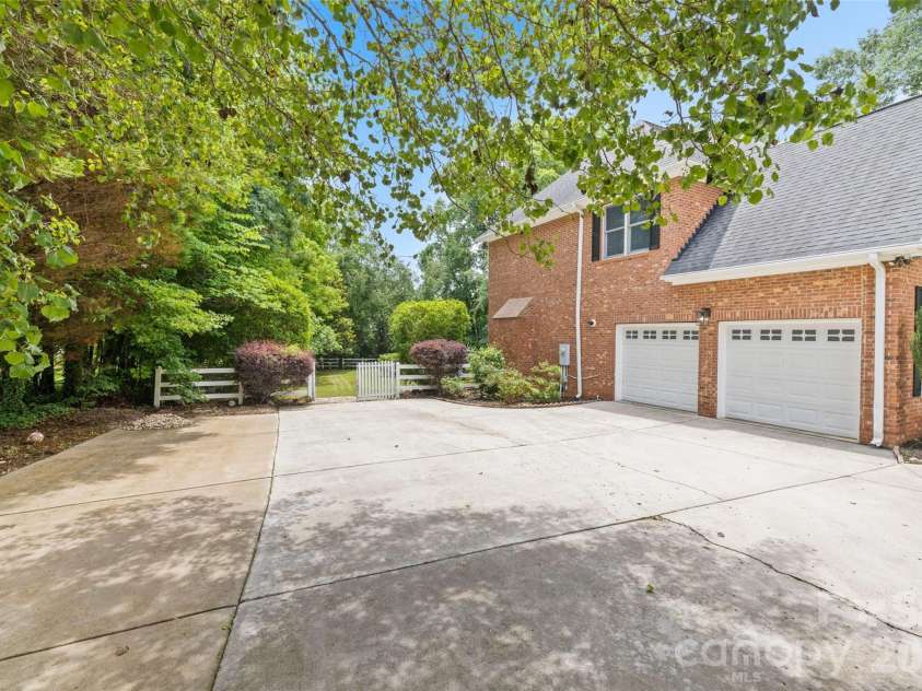 1321 Yellowood Court, Rock Hill, SC 29732.  MLS# CAR4384132, YatesRealty ID 30819. Ample driveway parking & side-load 2 car garage