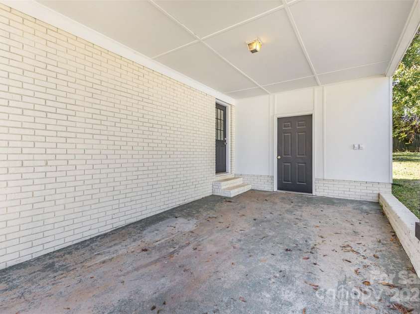 2334 Woodleaf Drive, Gastonia, NC 28052.  MLS# CAR4318820, YatesRealty ID 3082. Covered Carport