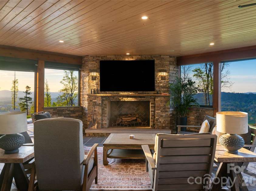 170 + 9999 Bear View Road, Weaverville, NC 28787.  MLS# CAR4392081, YatesRealty ID 30822. Back Deck with fireplace