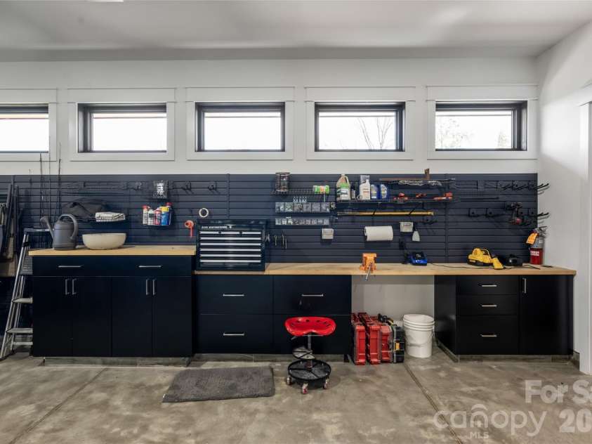 170 + 9999 Bear View Road, Weaverville, NC 28787.  MLS# CAR4392081, YatesRealty ID 30822. Garage work bench