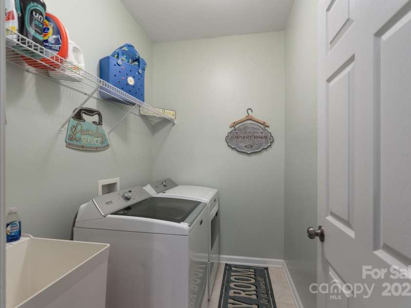 2205 Harding Place, Indian Trail, NC 28079.  MLS# CAR4279210, YatesRealty ID 30823. Main Level Laundry Room