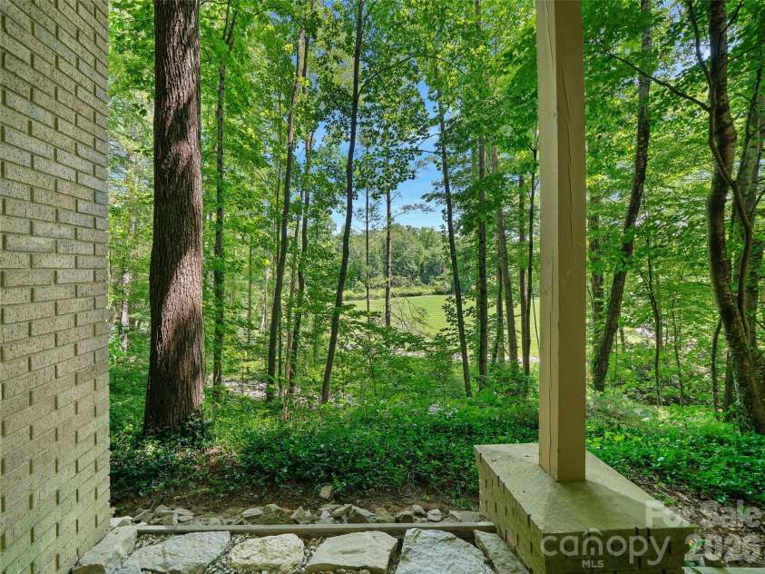 301 White Oak Drive, Hendersonville, NC 28791.  MLS# CAR4389297, YatesRealty ID 30823. Back view