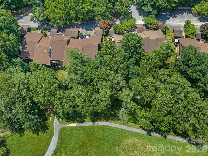 301 White Oak Drive, Hendersonville, NC 28791.  MLS# CAR4389297, YatesRealty ID 30823. Back View