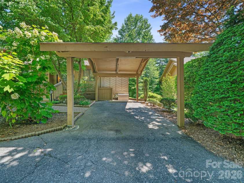 301 White Oak Drive, Hendersonville, NC 28791.  MLS# CAR4389297, YatesRealty ID 30823. Covered Parking Space