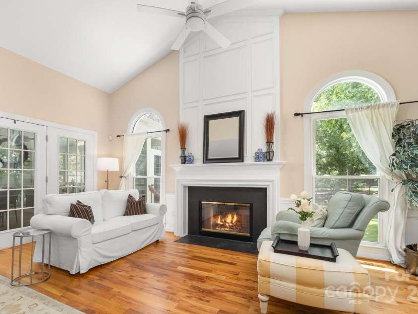 12214 Provincetowne Drive, Charlotte, NC 28277.  MLS# CAR4282352, YatesRealty ID 30824. Cozy area of the great room by the gas log fireplace