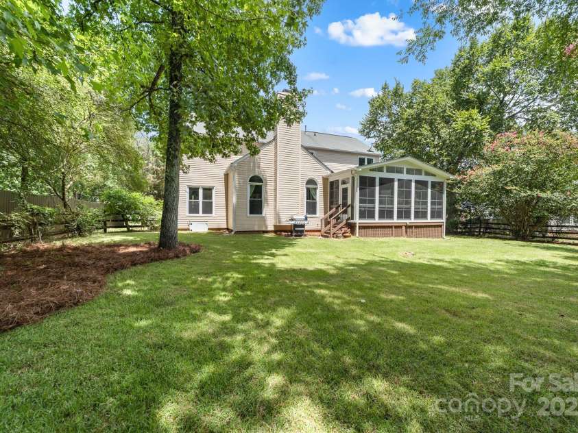12214 Provincetowne Drive, Charlotte, NC 28277.  MLS# CAR4282352, YatesRealty ID 30824. Private and level back yard
