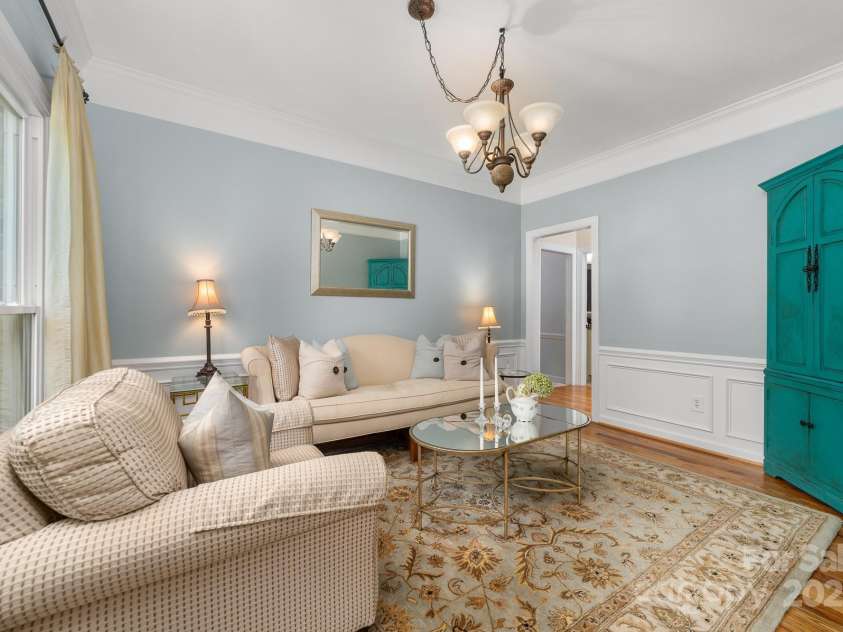 12214 Provincetowne Drive, Charlotte, NC 28277.  MLS# CAR4282352, YatesRealty ID 30824. Sitting room with lots of natural light and wainscoting