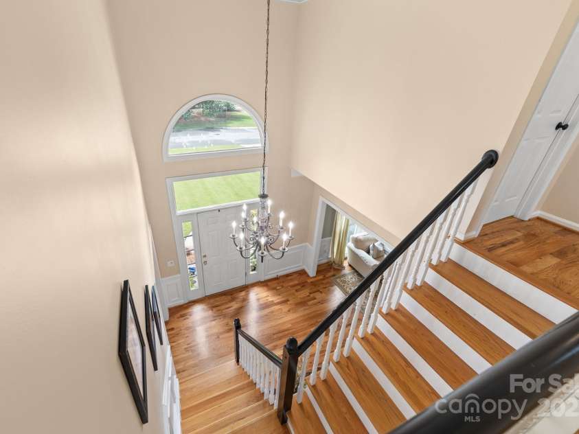 12214 Provincetowne Drive, Charlotte, NC 28277.  MLS# CAR4282352, YatesRealty ID 30824. View of foyer from upper level