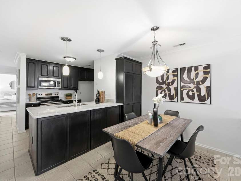 907 Southwest Drive, Davidson, NC 28036.  MLS# CAR4392317, YatesRealty ID 30832. 