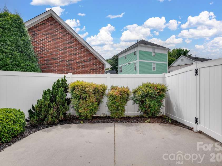 5945 Village Drive, Concord, NC 28027.  MLS# CAR4391952, YatesRealty ID 30834. Enclosed patio