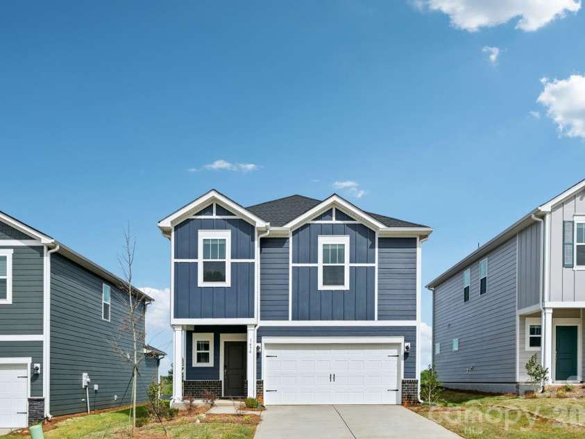 1445 Wildflower Street, Newton, NC 28658.  MLS# CAR4394124, YatesRealty ID 30835. Photo is not of the actual home, but is an inspirational photo of builder’s model home and may depict options, furnishings, and/or decorator features that are not included