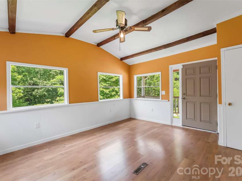 72 Paradise Lane, Old Fort, NC 28762.  MLS# CAR4393991, YatesRealty ID 30838. Heated sunroom