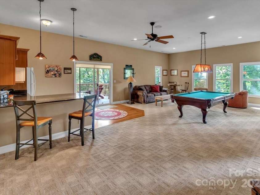 445 Equestrian Drive, Waynesville, NC 28786.  MLS# CAR4186837, YatesRealty ID 3084. Lower Level Game Room/Family Room