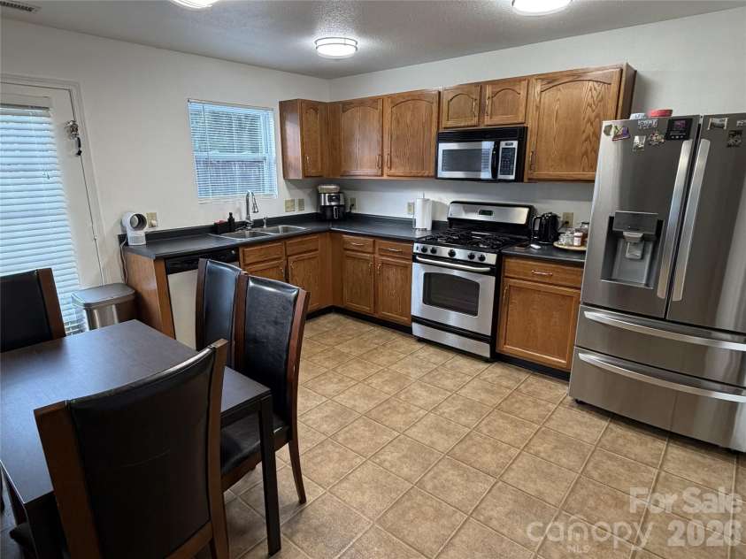 6445 Matlea Court, Charlotte, NC 28215.  MLS# CAR4385744, YatesRealty ID 30840. Kitchen and breakfast area