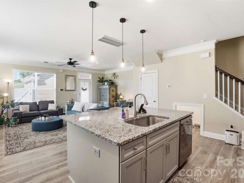 1012 Township Parkway, Belmont, NC 28012.  MLS# CAR4388525, YatesRealty ID 30841. Kitchen looking into living room