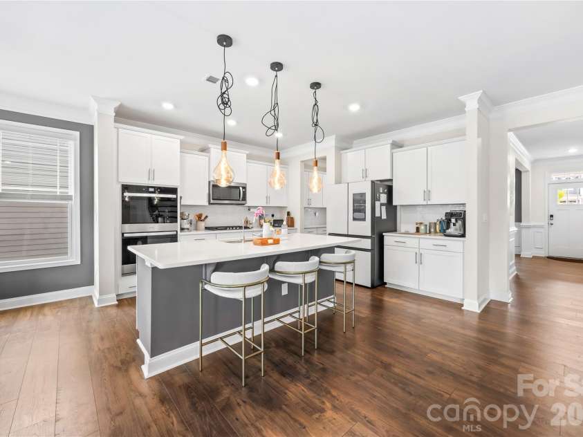 116 Aviendha Lane, Troutman, NC 28166.  MLS# CAR4392002, YatesRealty ID 30849. White farmhouse kitchen