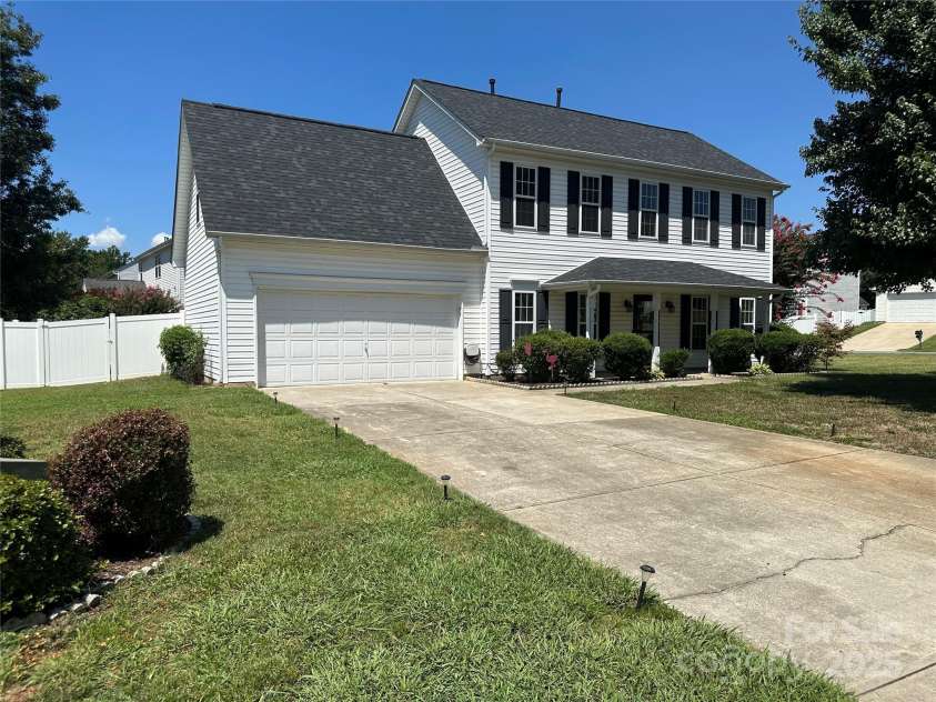 5845 Mahogany Place, Concord, NC 28025.  MLS# CAR4283667, YatesRealty ID 30850. 2 car garage; Minimal step into home from garage and front door.
