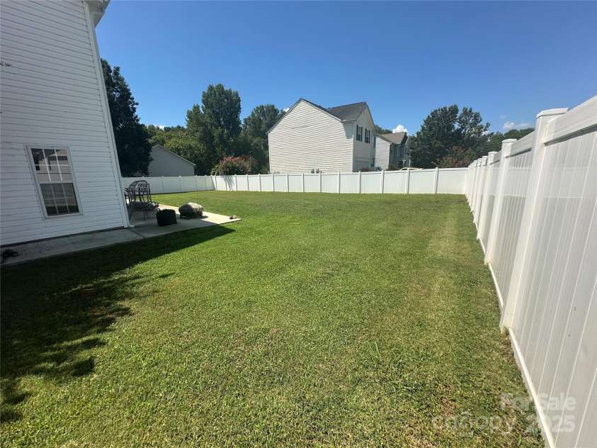 5845 Mahogany Place, Concord, NC 28025.  MLS# CAR4283667, YatesRealty ID 30850. Completely fenced in backyard