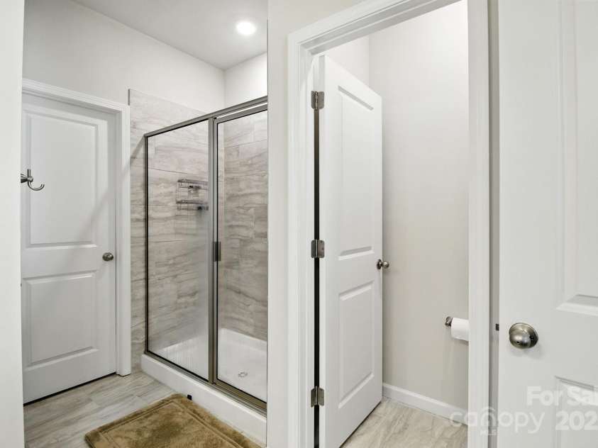 8156 Merryvale Lane, Charlotte, NC 28214.  MLS# CAR4286436, YatesRealty ID 30855. Master Bathroom
