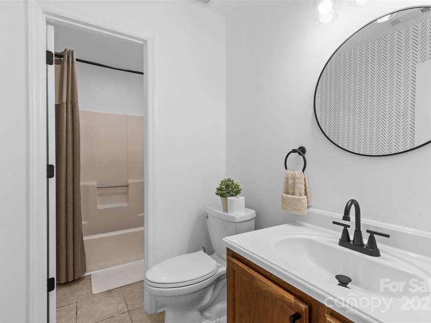 6201 Sunbridge Court, Charlotte, NC 28269.  MLS# CAR4259061, YatesRealty ID 30856. 1st half bath