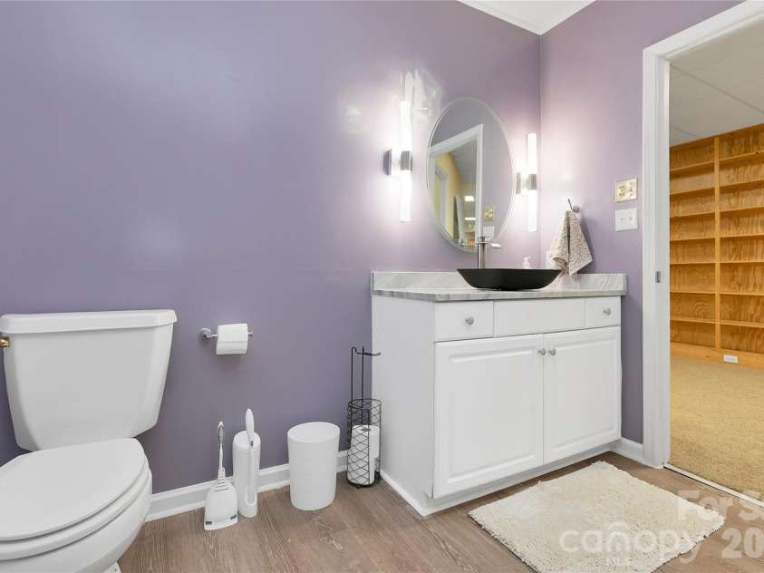 154 Chestnut Lane, Cedar Mountain, NC 28718.  MLS# CAR4388442, YatesRealty ID 30858. Downstairs full guest bathroom