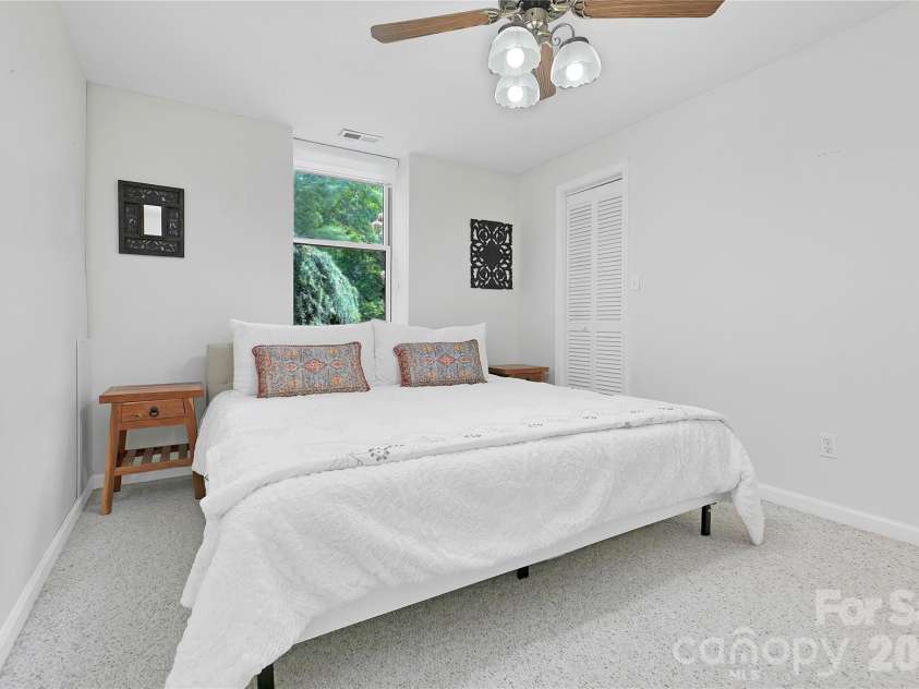 154 Chestnut Lane, Cedar Mountain, NC 28718.  MLS# CAR4388442, YatesRealty ID 30858. Downstairs Guest room
