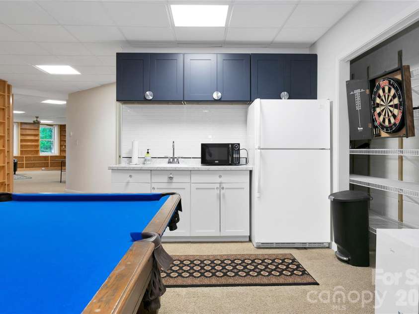 154 Chestnut Lane, Cedar Mountain, NC 28718.  MLS# CAR4388442, YatesRealty ID 30858. Downstairs kitchenette for guests