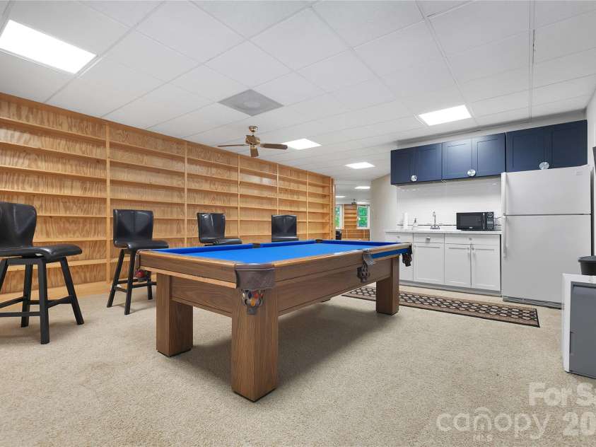 154 Chestnut Lane, Cedar Mountain, NC 28718.  MLS# CAR4388442, YatesRealty ID 30858. Downstairs Rec Room