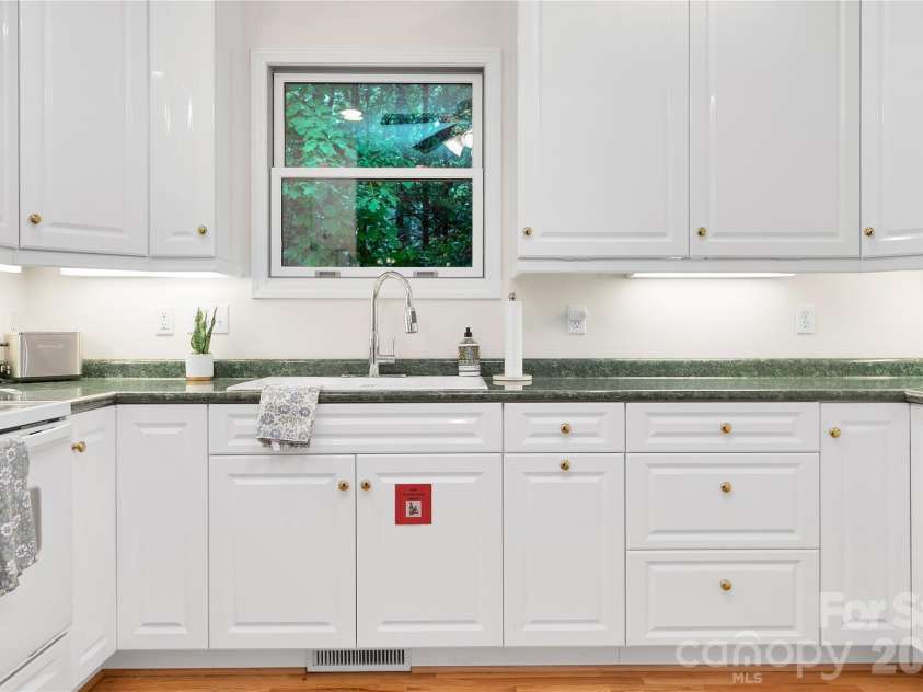 154 Chestnut Lane, Cedar Mountain, NC 28718.  MLS# CAR4388442, YatesRealty ID 30858. Guest house kitchen