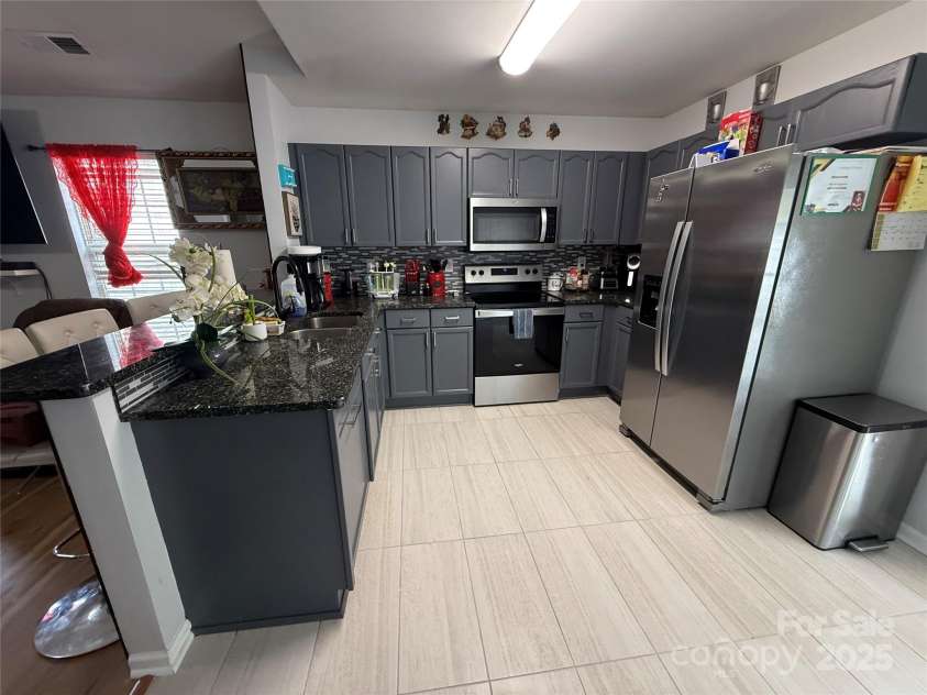 6807 Jamison Lane, Charlotte, NC 28269.  MLS# CAR4317327, YatesRealty ID 3086. 