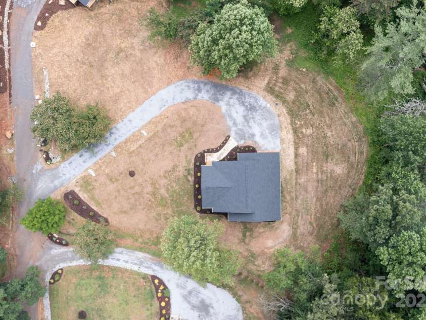 82 Lillycrop Lane, Hendersonville, NC 28792.  MLS# CAR4273359, YatesRealty ID 30864. Aerial of 82 Lillycrop Lane