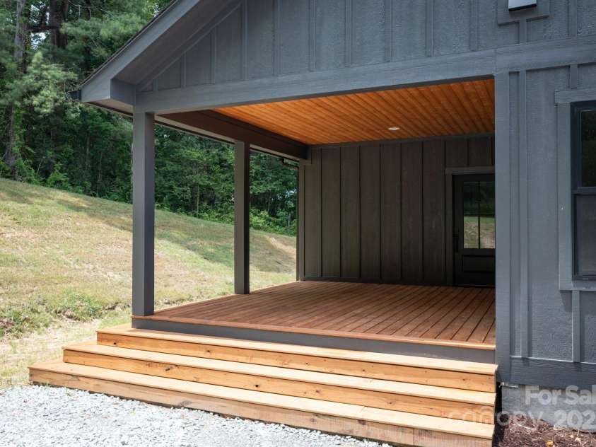 82 Lillycrop Lane, Hendersonville, NC 28792.  MLS# CAR4273359, YatesRealty ID 30864. Covered back deck perfect for entertaining