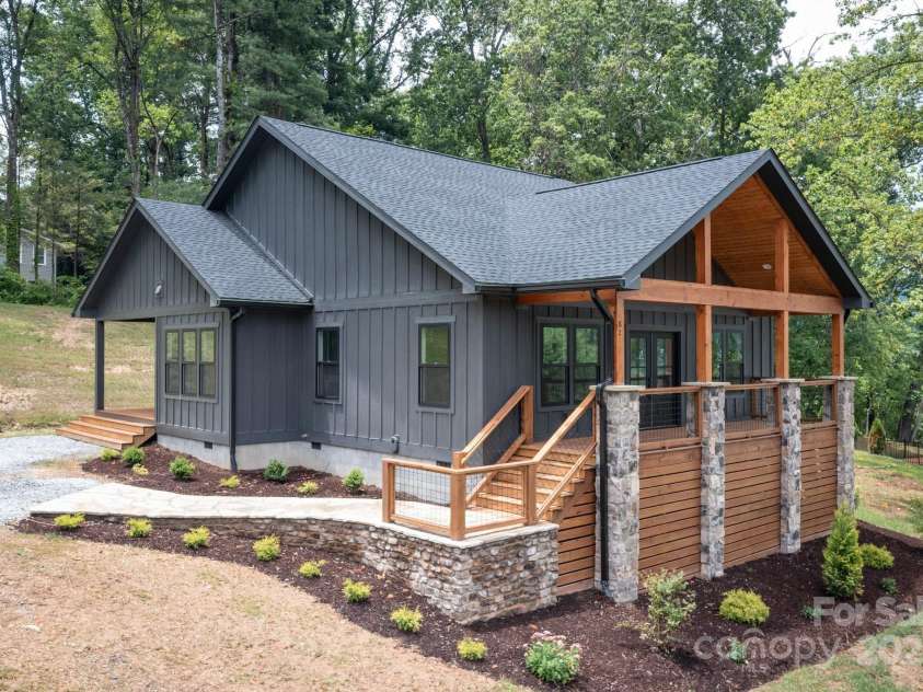 82 Lillycrop Lane, Hendersonville, NC 28792.  MLS# CAR4273359, YatesRealty ID 30864. Front entrance featuring beautiful stone walkway