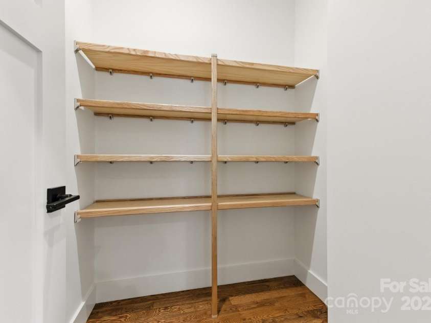 82 Lillycrop Lane, Hendersonville, NC 28792.  MLS# CAR4273359, YatesRealty ID 30864. Sizable pantry for easy food storage