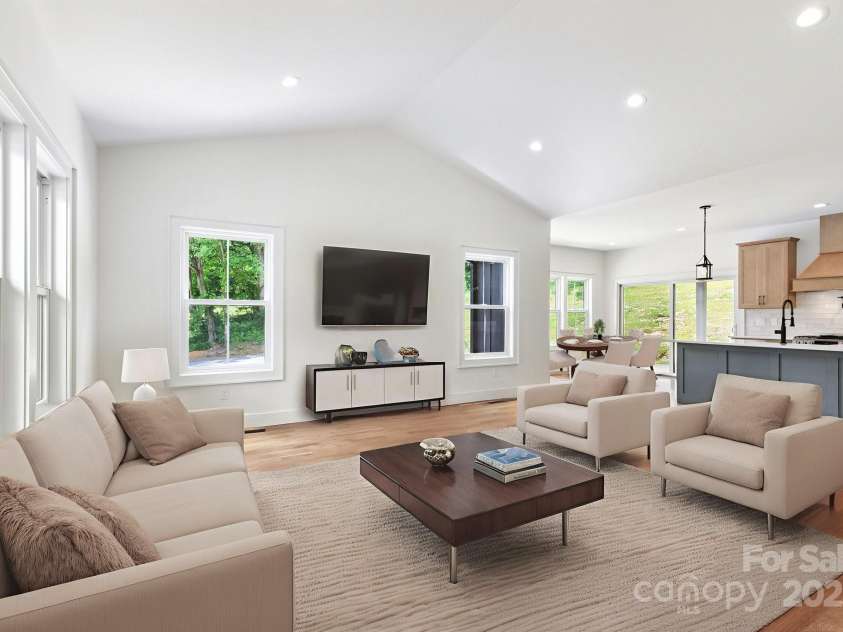 82 Lillycrop Lane, Hendersonville, NC 28792.  MLS# CAR4273359, YatesRealty ID 30864. Virtually staged living and dinning rooms