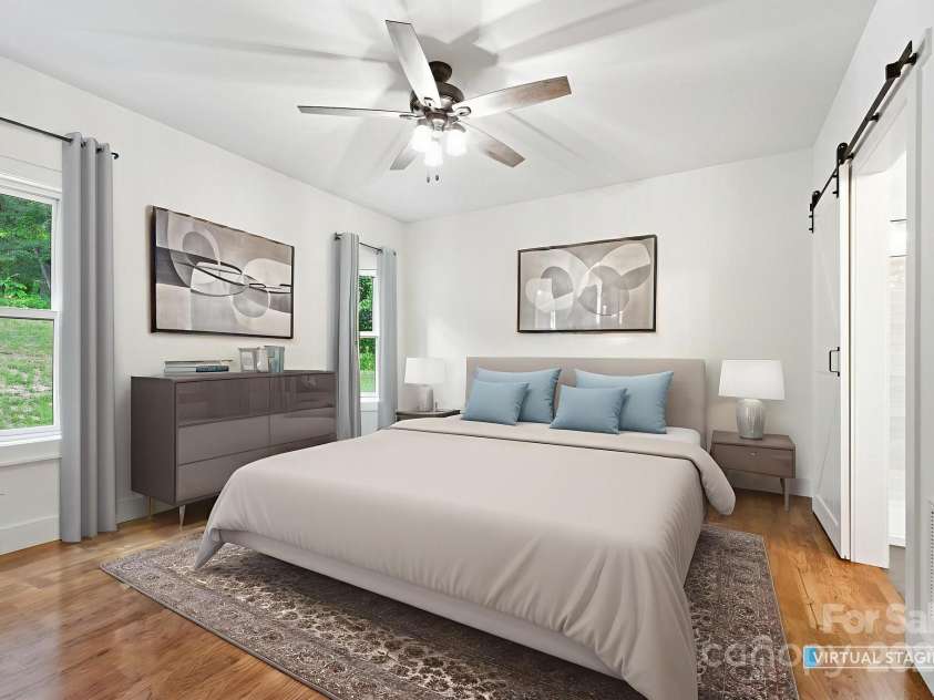 82 Lillycrop Lane, Hendersonville, NC 28792.  MLS# CAR4273359, YatesRealty ID 30864. Virtually staged primary bedroom