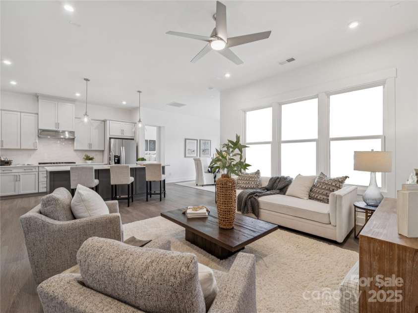 5343 Mint Harbor Way, Charlotte, NC 28269.  MLS# CAR4288565, YatesRealty ID 30867. Actual home. Staged with furniture. Great Room.