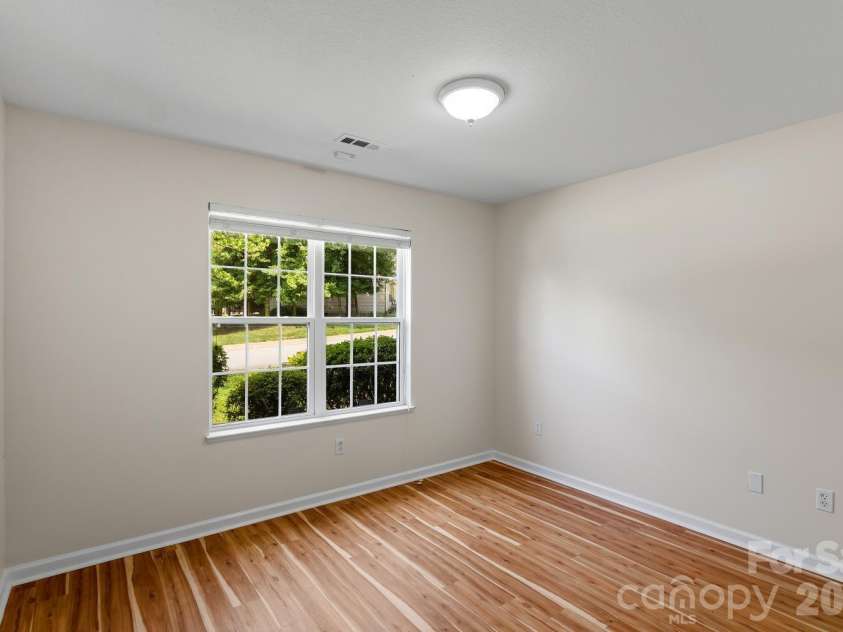 308 Wiltshire Circle, Fletcher, NC 28732.  MLS# CAR4389332, YatesRealty ID 30869. Front bedroom.