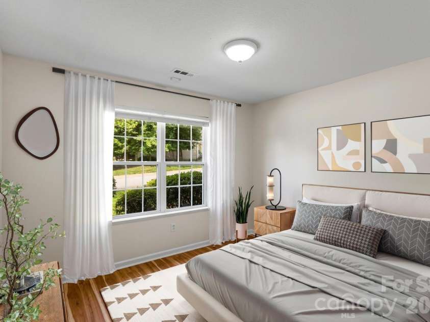 308 Wiltshire Circle, Fletcher, NC 28732.  MLS# CAR4389332, YatesRealty ID 30869. Front bedroom (image virtually staged).