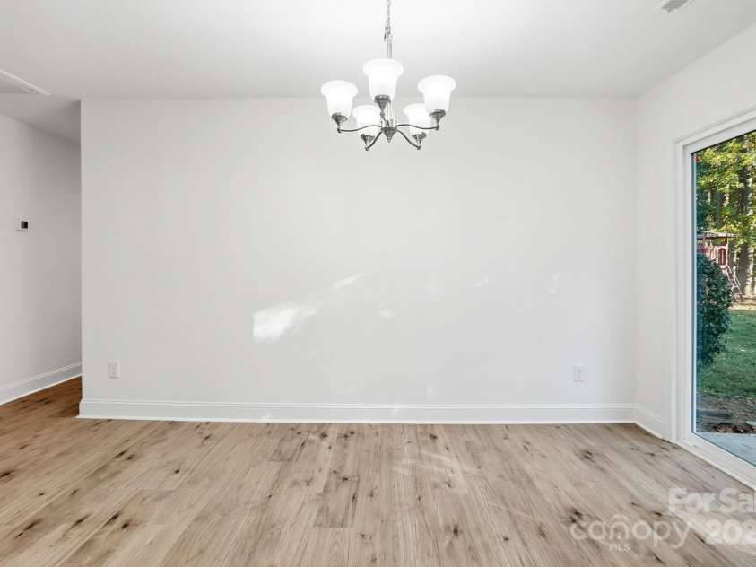 10200 Atchinson Drive, Mint Hill, NC 28227.  MLS# CAR4316126, YatesRealty ID 3087. Dining room