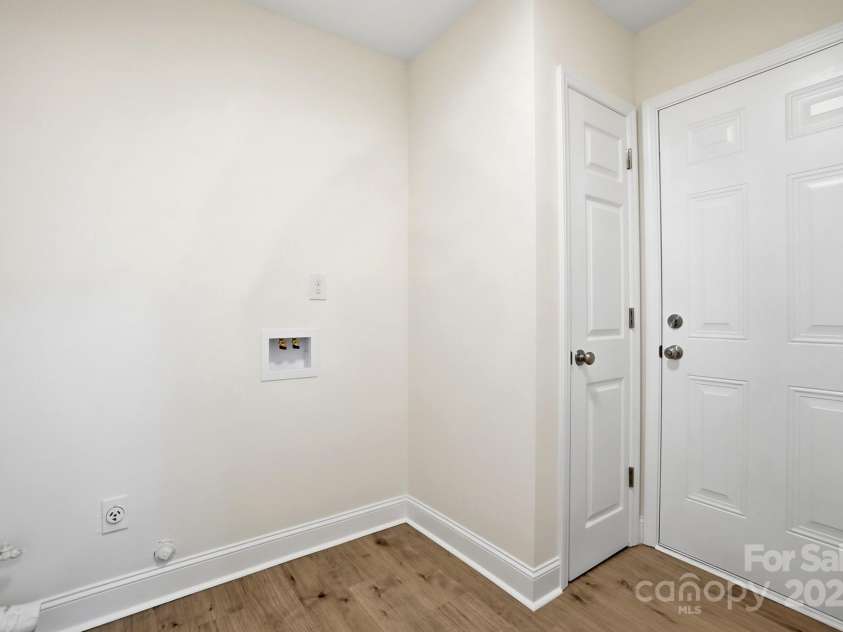 10200 Atchinson Drive, Mint Hill, NC 28227.  MLS# CAR4316126, YatesRealty ID 3087. Laundry room 