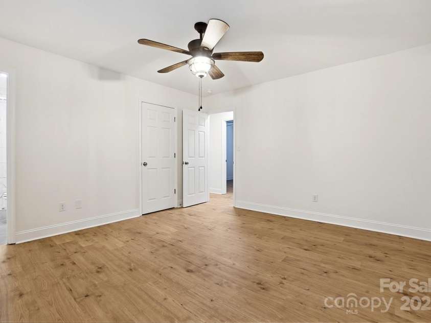 10200 Atchinson Drive, Mint Hill, NC 28227.  MLS# CAR4316126, YatesRealty ID 3087. Primary bedroom