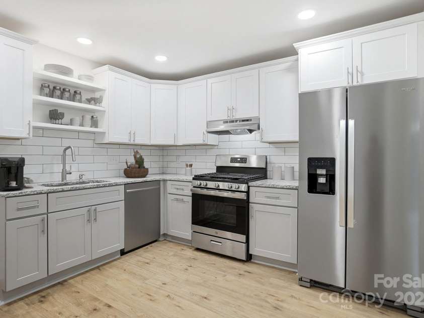 10200 Atchinson Drive, Mint Hill, NC 28227.  MLS# CAR4316126, YatesRealty ID 3087. This room has been virtually staged and added a dishwasher, the actual dishwasher will installed soon.