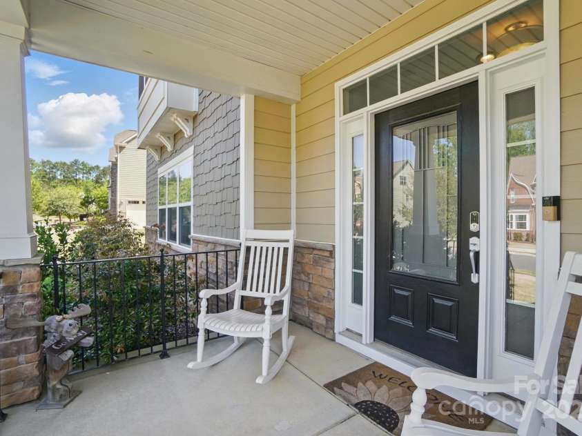 16831 Alydar Commons Lane, Charlotte, NC 28278.  MLS# CAR4256339, YatesRealty ID 30870. Rocking Chair Front Porch