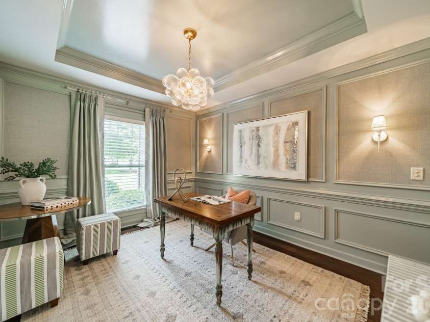 701 Copper Tree Lane, Waxhaw, NC 28173.  MLS# CAR4378056, YatesRealty ID 30870. Professionally designed study with designer bubble chandelier, custom moldings and grasscloth walpaper