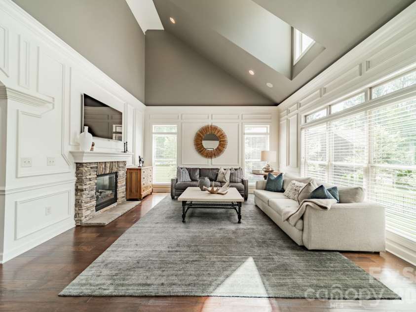 701 Copper Tree Lane, Waxhaw, NC 28173.  MLS# CAR4378056, YatesRealty ID 30870. Spacious Family Room with stacked stone fireplace